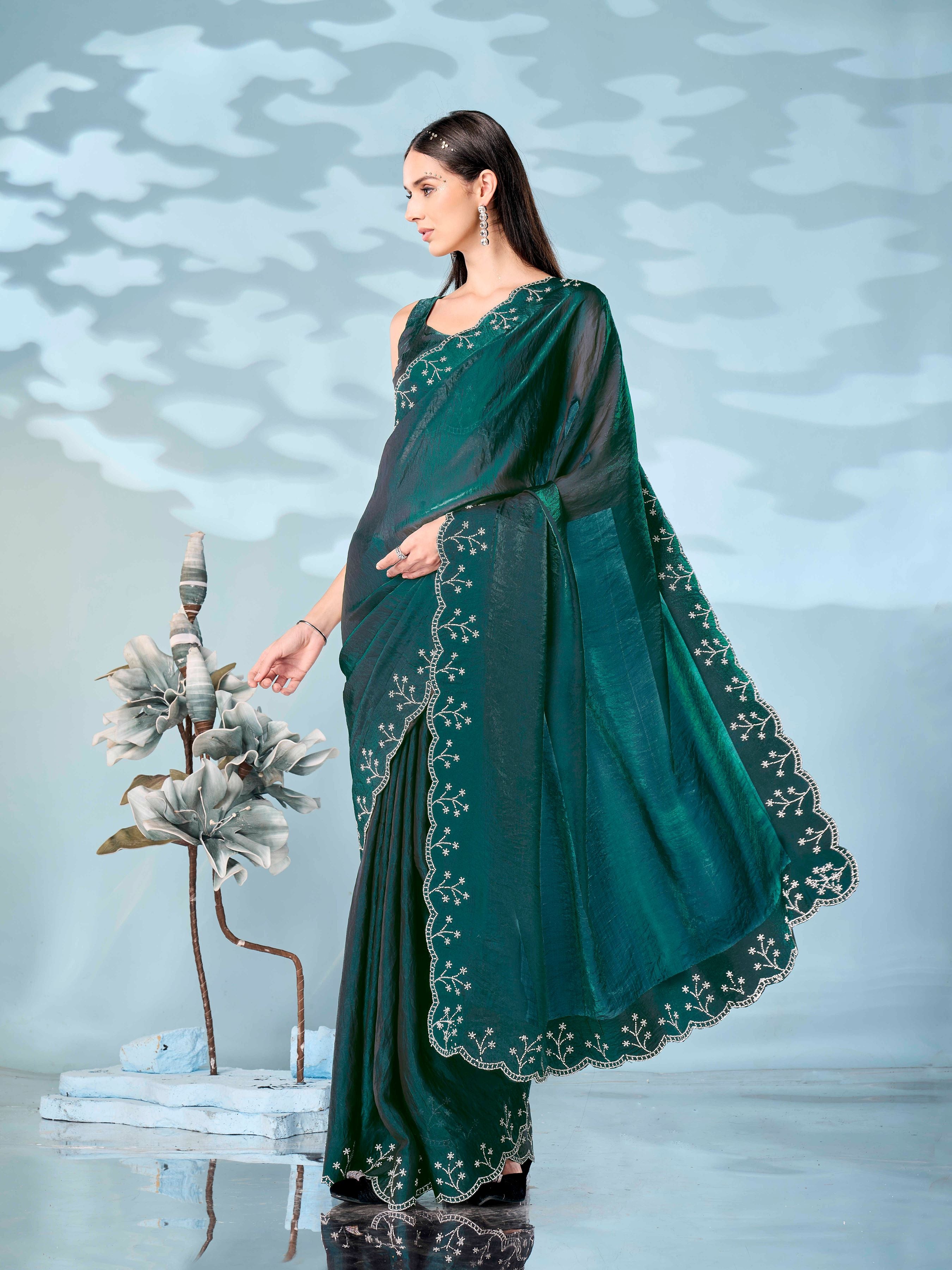 Two tone green & maroon colored satin saree with heavy work